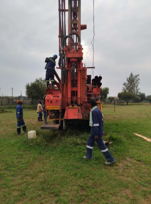 Borehole drilling rig setup