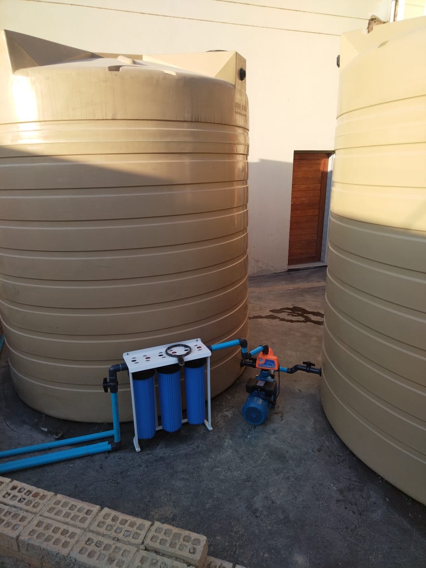 Filtration system with pump and tanks